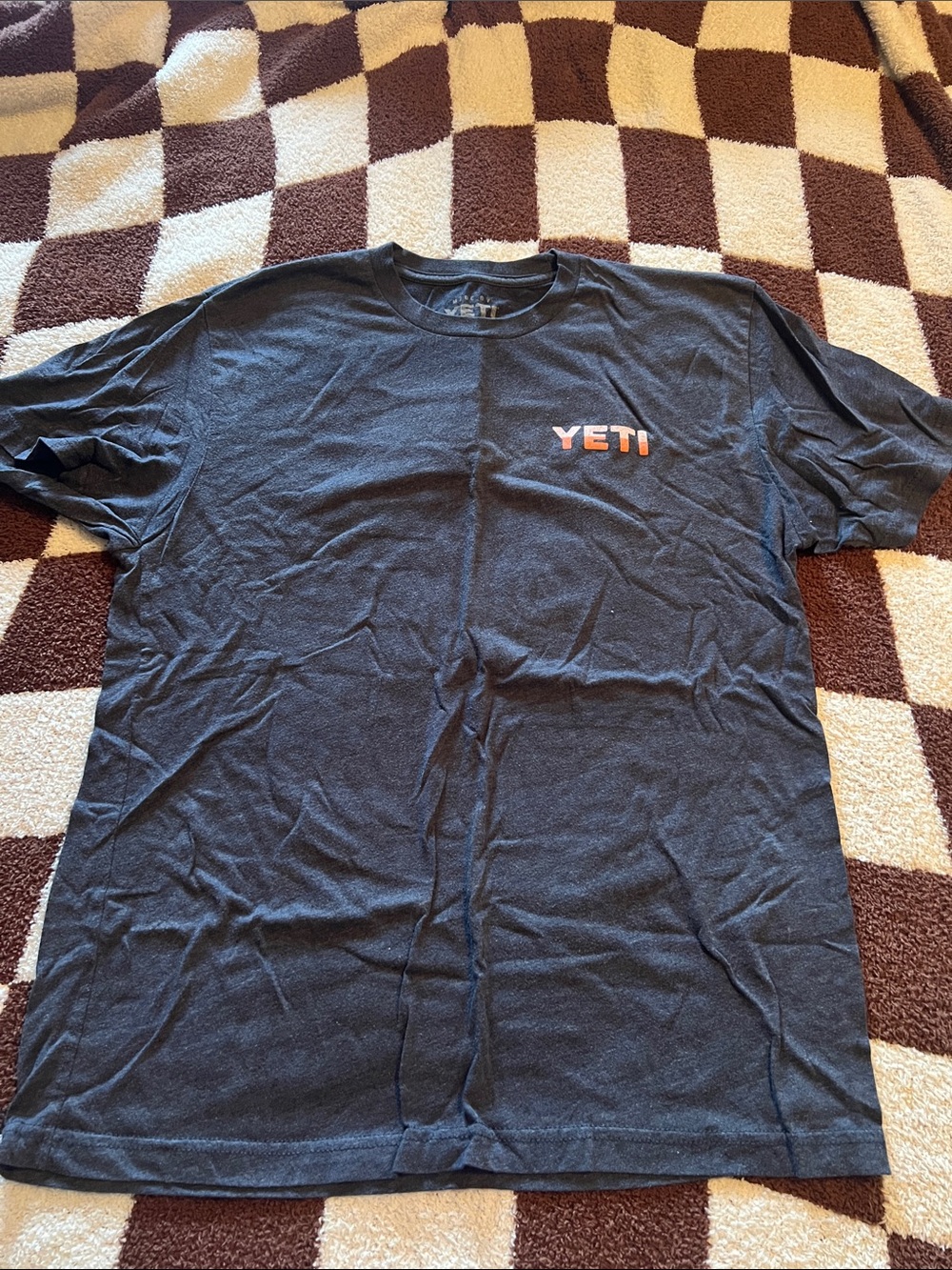 Yeti Black Short Sleeve Tee with Orange YETI Chest Logo